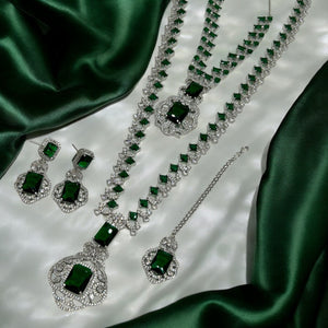 Green emerald stone necklace and earrings combo set inspired by Nita Ambani.
